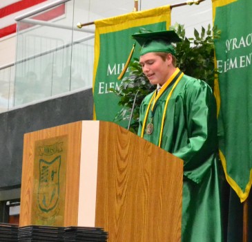 Valedictorian Brock Spangle takes his turn at the podium.