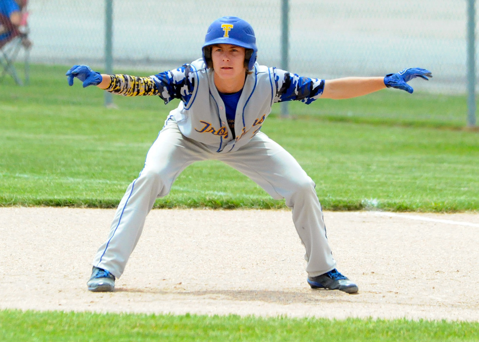 Triton's Cordale Keyser readies himself in leading from first against Fort Wayne Blackhawk at the Triton Baseball Regional. The Braves shut out the Trojans, 14-0, in the first semi-final game. (Photos by Mike Deak)