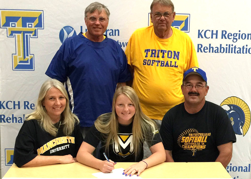 Triton High School senior Krystal Sellers has signed a letter of intent to continue her softball career at Manchester University. Seated with Krystal are parents Michelle and Chuck Sellers. In the back row are Steve McBride and Bill Keyser. (Photo provided by THS Athletics)