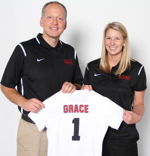 Grace AD Chad Briscoe (left) poses with new volleyball coach Katie Van Hofwegen. 