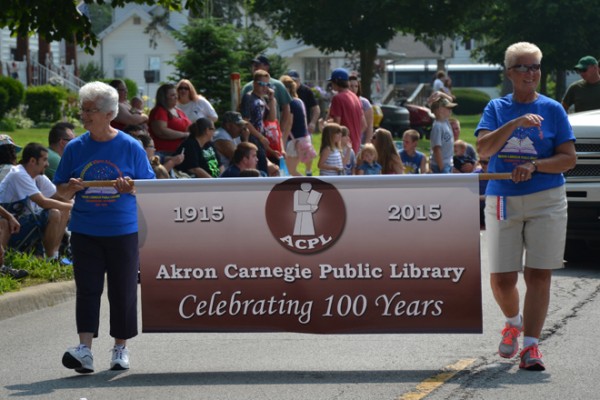 Akron Carnegie Public Library led the parade to celebrate their 100 year anniversary. 