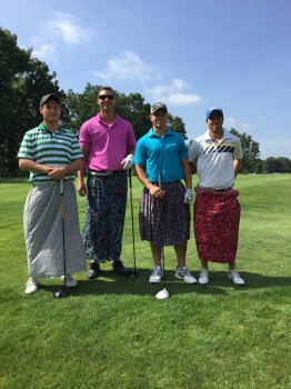 There was no shame for some, offering a small donation for a chance to golf in dresses at the 2015 Lady Tiger golf outing Saturday at Rozella Ford Golf Outing. (Photo provided)