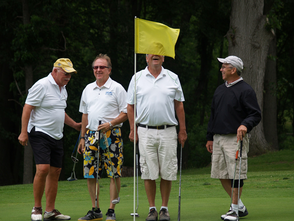 Participants share a light moment at the 2014 Kosciusko Chamber of Commerce Golf Classic. (Photo provided)