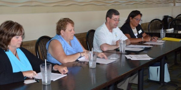 From left: Jean Scallon, chief executive officer of Bloomington Meadows Hospital and Indiana Suicide Prevention Advisory Council Chair; Janet Schnell, president of Survivors of Suicide of Dubois County; Brett Boggs, TVS superintendet; Alice Jordan-Miles, assistant director of IPFW. 