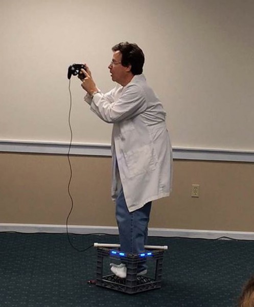 Professor Steve demonstrates Superman’s power of levitation, using principles of science at the“Science of Superman Show”on Wednesday, July 22. Everyone enjoyed the show.