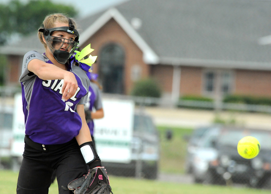 Mentone Starz pitcher Tracy Smith works against Pioneer in the first round game of the 12U State Softball tournament at Rochester Saturday afternoon. (Photos by Mike Deak)