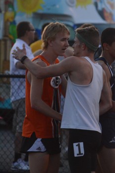 Daniel Messenger is congratulated by a competitor after a race this past spring.