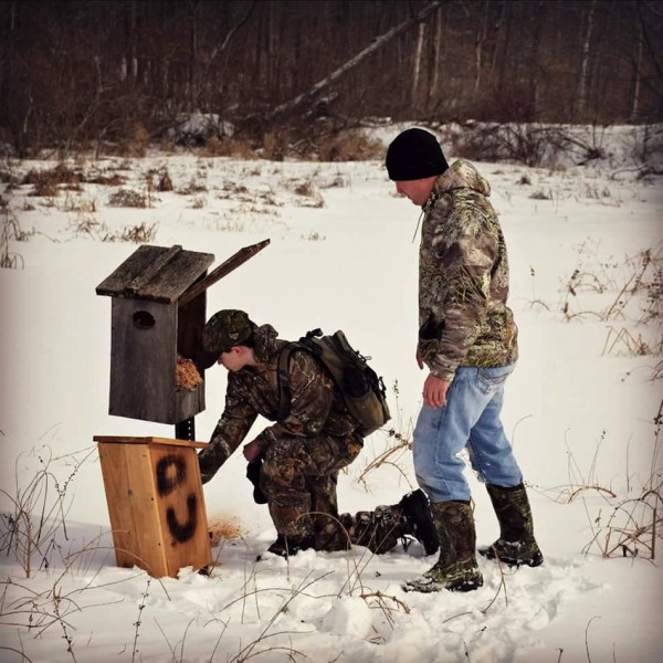 DU members replace an old wood duck box with a newly built one on the property of Tri-County. (Photos Provided)