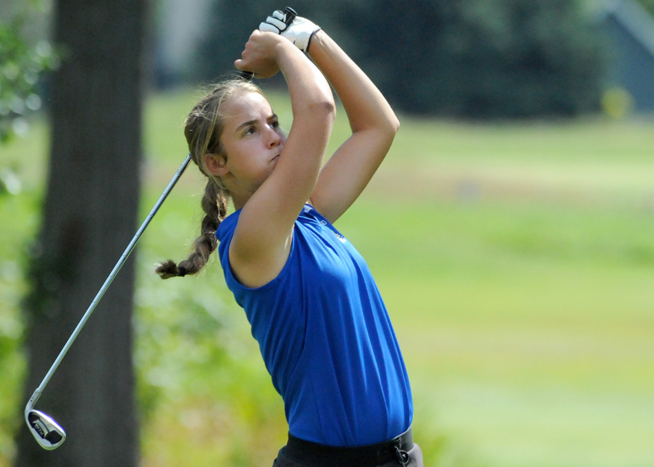 Homestead No. 1 Makenna Hostetter was the woman of the match Saturday at the Warsaw Girls Golf Invite, shooting an 85 to claim medalist honors. Her team also won the team title, shooting a 356. (Photos by Mike Deak)