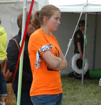 Wearing a zebra armband to identify her class, Wawasee sophomore Gynnae Hochstetler awaits the end of class so she can escort her charges to the next station.