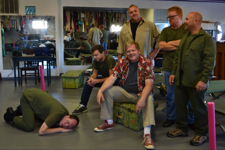 Filled with comedic scenes and familiar characters, Center Street Community Theatre’s production of “M*A*S*H” will be coming to Wagon Wheel’s stage Oct. 2 and 3, plus 9 and 10. The play features about 30 local individuals. In front, Jason Dugger as Radar listens for incoming wounded. Seated from left are Eric Totheroh as Ugly and Jay Rigdon as Hawkeye. In back are Ian Crighton as Duke; Todd Lucas as Major Frank Burns; and Eddie Hartman as Trapper John.