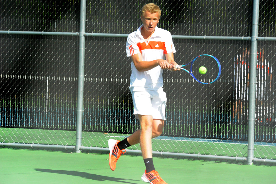 Warsaw No. 3 singles player Andrew Gauger is 6-0 in the position heading into the NLC tournament this week. (Photos by Mike Deak)