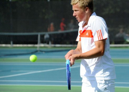 Andrew Gauger of Warsaw fires a shot in the No. 3 singles bracket.