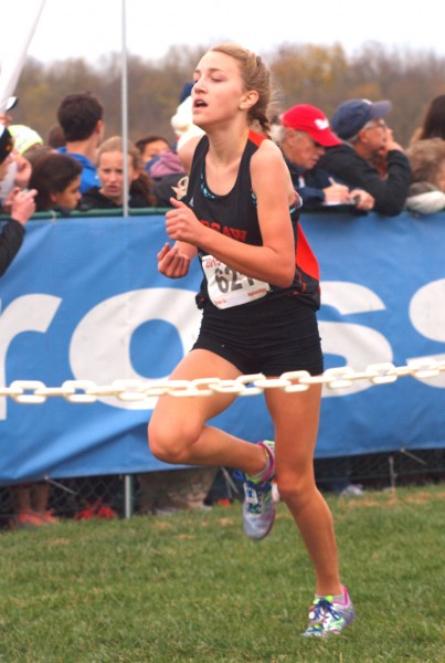 Mia Beckham runs the race of her life, finishes 20th and earns All-State honors at Saturday's IHSAA girls state cross country finals. (Photo by Tim Creason)