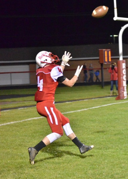 Cam Eveland grabs a wide open touchdown for Plymouth during a 66-7 Rockie victory over Wawasee. (Photos by Nick Goralczyk)