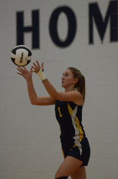 Hannah Delp prepares to serve for LCA.