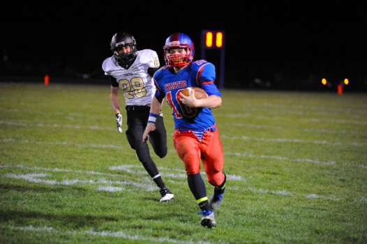 Whitko quarterback Garrett Elder gets into space during his 56-yard touchdown run.