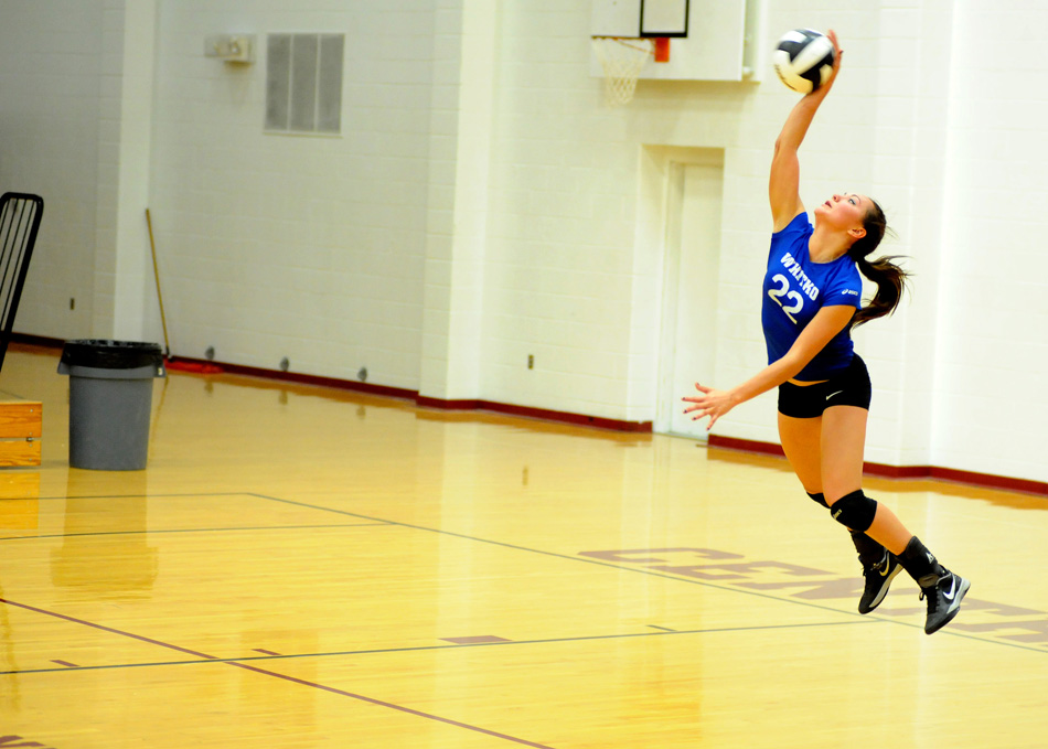 Kaitlyn Reed serves to LaVille.