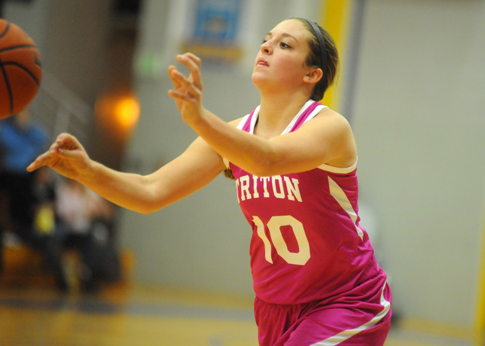 Triton's Nicole Sechrist dons the pink uniform for 2014's Hoops For Hope game against Plymouth.