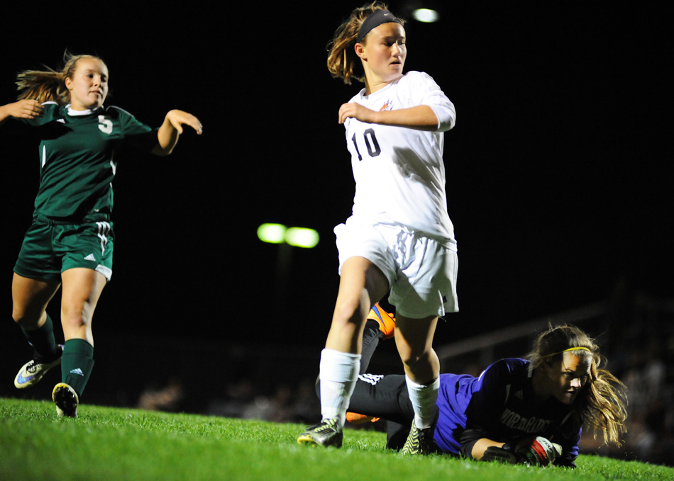 Warsaw's Liz Van Wormer beat Northridge goalkeeper Meghan Cawood for a goal in the 69th minute, helping Warsaw to a 1-1 tie Thursday night and the Northern Lakes Conference girls soccer crown.