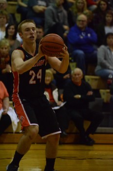 Evan Schmidt prepares to pass the ball.