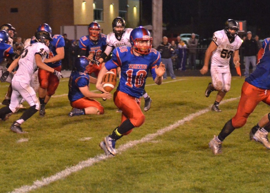 Garrett Elder breaks away for one of several big runs in Friday's win over Churubusco. (File photo by Nick Goralczyk)