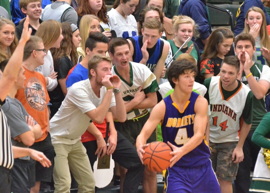Wawasee's student tries to distract Angola's Jake Honer. (Photos by Nick Goralczyk)