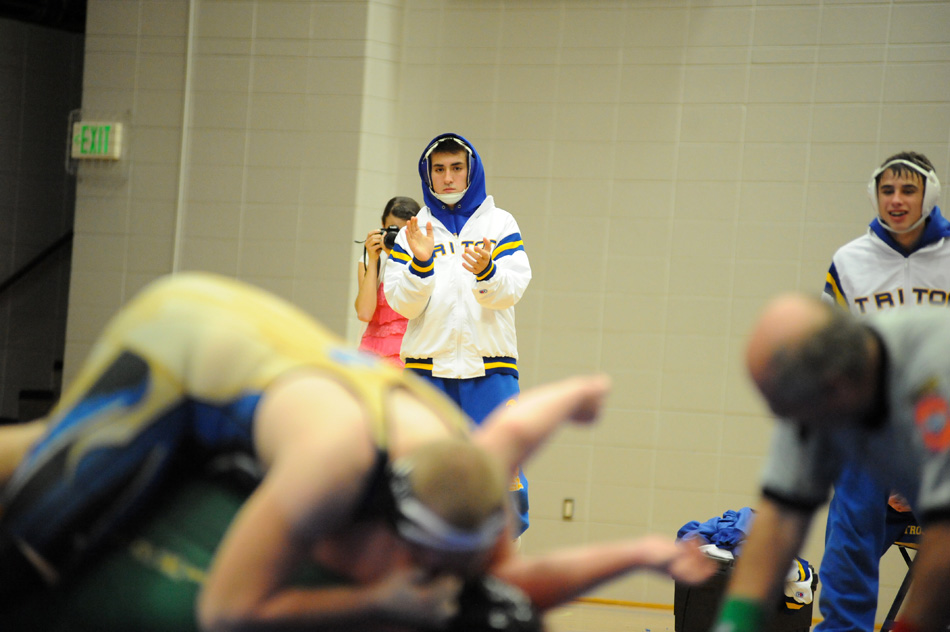 Triton is hoping a massive team effort will keep wrestlers like Vincent Helton cheering on pins this winter. (Photo by Mike Deak)
