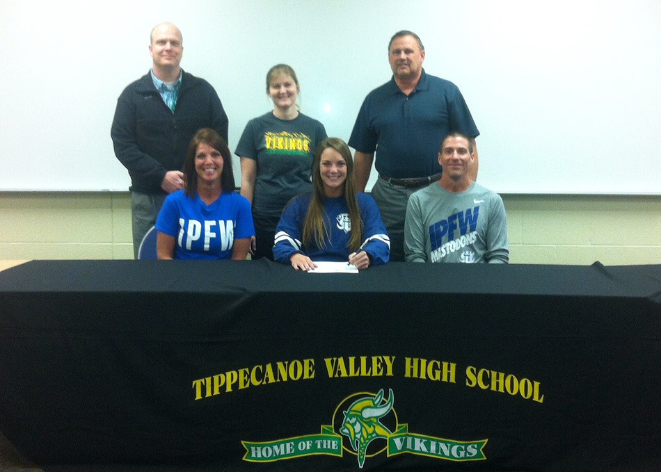 Tippecanoe Valley senior Lexi O'Connell has signed a national letter of intent to continue her track career at IPFW. Seated with Lexi are parents Julie and Pat O'Connell. In the back row are TVHS principal Dr. Michael Bendicsen, TVHS track coach Alysha Wachtmann and TVHS athletic director Duane Burkhart. (Photo provided) 