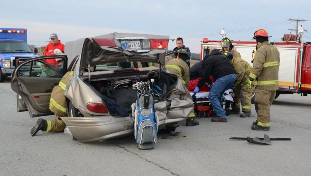 passenger extricated from vehicle