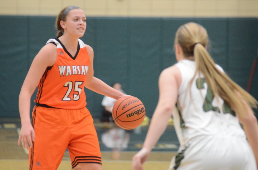 Madi Graham runs the show for Warsaw Saturday night. The junior led the Tigers to a 36-30 NLC win at Wawasee.