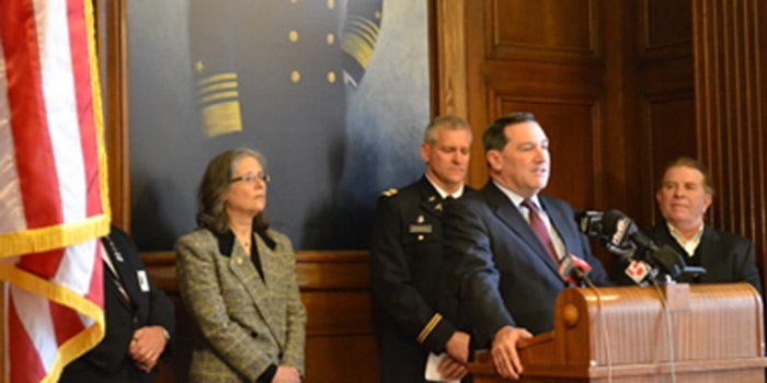 Donnelly is joined by organizations supporting the "Care Package." (Photo provided)