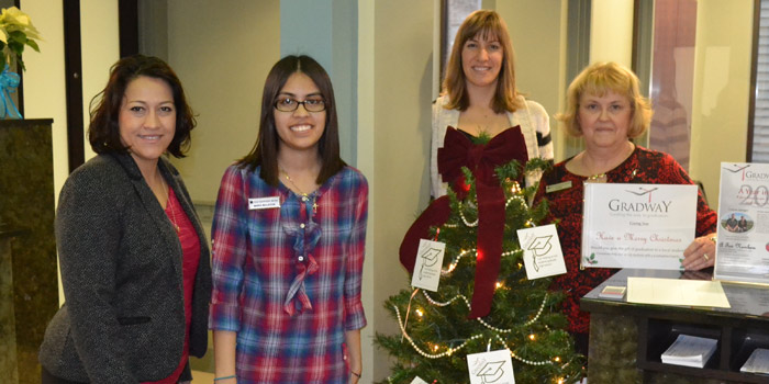 Old National Bank staff pose with Gradway Giving Tree.