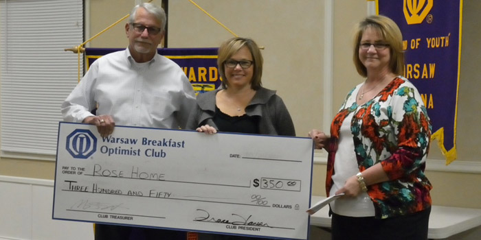 From left are Art Gakstatter representing The Warsaw Breakfast Optimist Club, with Tammy Cotton and Lorna Snodgrass representing The Rose Home.