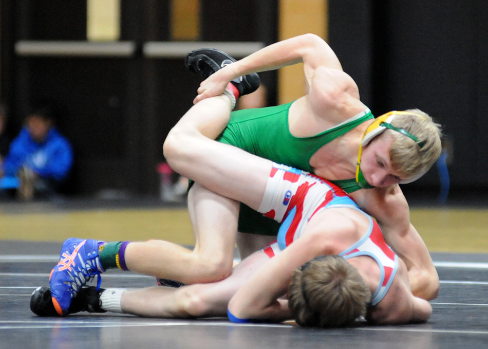 Chevy Teeter of Tippecanoe Valley controls Zach Purcell of Maconaquah in the 132-pound bracket.