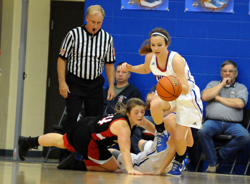 Hanna Yohe creates one of 27 turnovers Whitko coaxed out of Manchester Friday night.