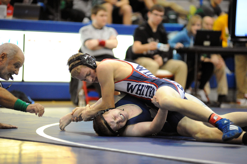 Whitko's Issac Walters turns over Norwell's Jared Cross before scoring a pin at the Whitko Wrestling Invitational Wednesday morning. (Photos by Mike Deak)