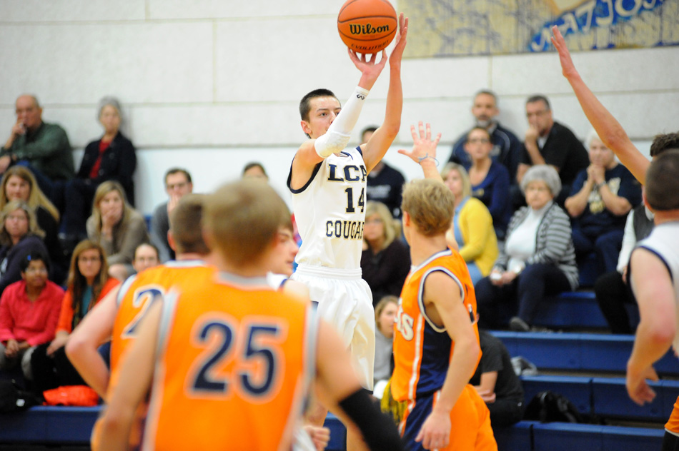 LCA's Jon Harmon launches a three-pointer Tuesday night against Benton Home School. (Photos by Mike Deak)