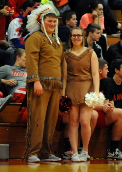 Goshen senior cheerleaders Matt Truex and Camryn Branson wear the Redskins mascot costumes for the final time.