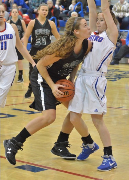 Aubrey Schmeltz gets called for a charge in the first half of Tuesday's game at Whitko. (Photos by Nick Goralczyk)