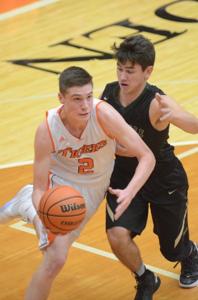 Junior guard Kyle Mangas will lead his undefeated Warsaw squad into an NLC clash at NorthWood Friday night (File photo by Scott Davidson)