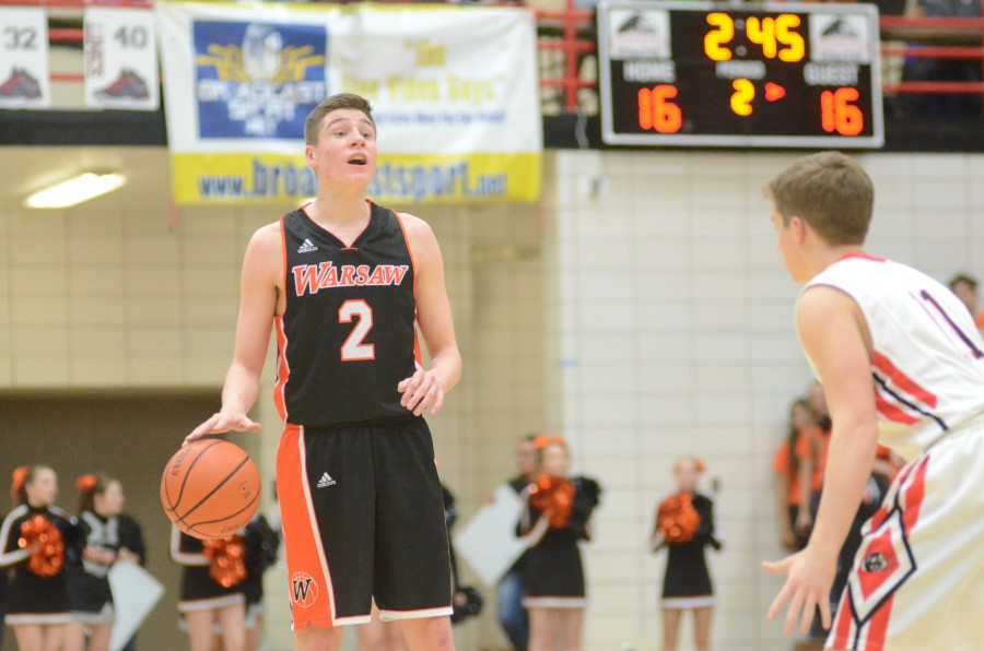 Kyle Mangas calls out a play for Warsaw Friday night. The junior star had 10 points as the undefeated Tigers beat NorthWood 51-35 in Nappanee.