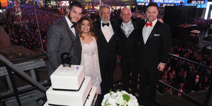 Pictured form left are First Couple of 2016 finalists Alfredo Hernandez, Monica Corrales, Alexander Eisele and Michael Westbrook, joining Generation Tux CEO and founder George Zimmer. (Photo by Brad Barket/Getty Images for Generation Tux)