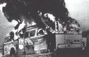 Freedom Ride bus aflame, Anniston Alabama, May 14, 1961