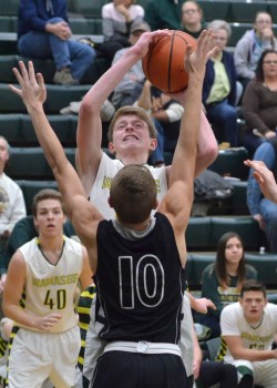 Jairus Boyer gets fouled during a shot in the fourth quarter of Tuesday's game. (Photo by Nick Goralczyk)