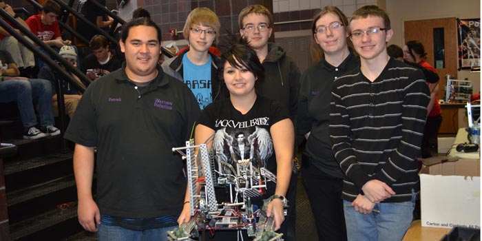 Pictured in front from left are senior co-captain Patrick Mosher, senior Marie Hoover holding That One Robot and sophomore Ethan Boorem. In back are sophomore Evan Mosma, sophomore Alex Fisher and senior co-captain Kara Blair. (Photos by Amanda McFarland)