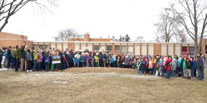 A crowd gathers for a ceremonial ground breaking for the Washington Elementary School construction project, slated to begin soon. (Photo by Amanda McFarland)