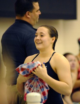 Northridge diver Sara Troyer broke the meet record with a 511.70, leading a quartet of divers who broke the old NLC record.