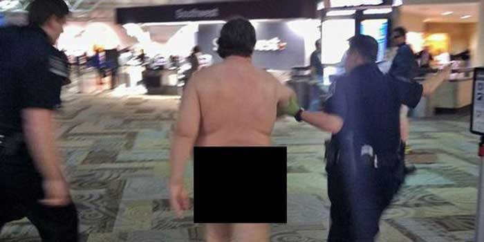 The man was taken into custody after streaking through the airport