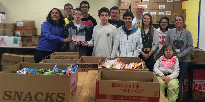 Tippecanoe Valley Schools Life Skills class, from left: Rosy Jansma, K21 board of directors; Gage Williams, Floyd Bradley, Miles Fowley and Sara Shumacher. Back row: Eric Hume, River Thomas, Mike Bendicsen, principal; Emma Coppes, teacher; Jenna Schultz, student intern; Kendra Kimes, instructional assistant (Photo by Michelle Reed)